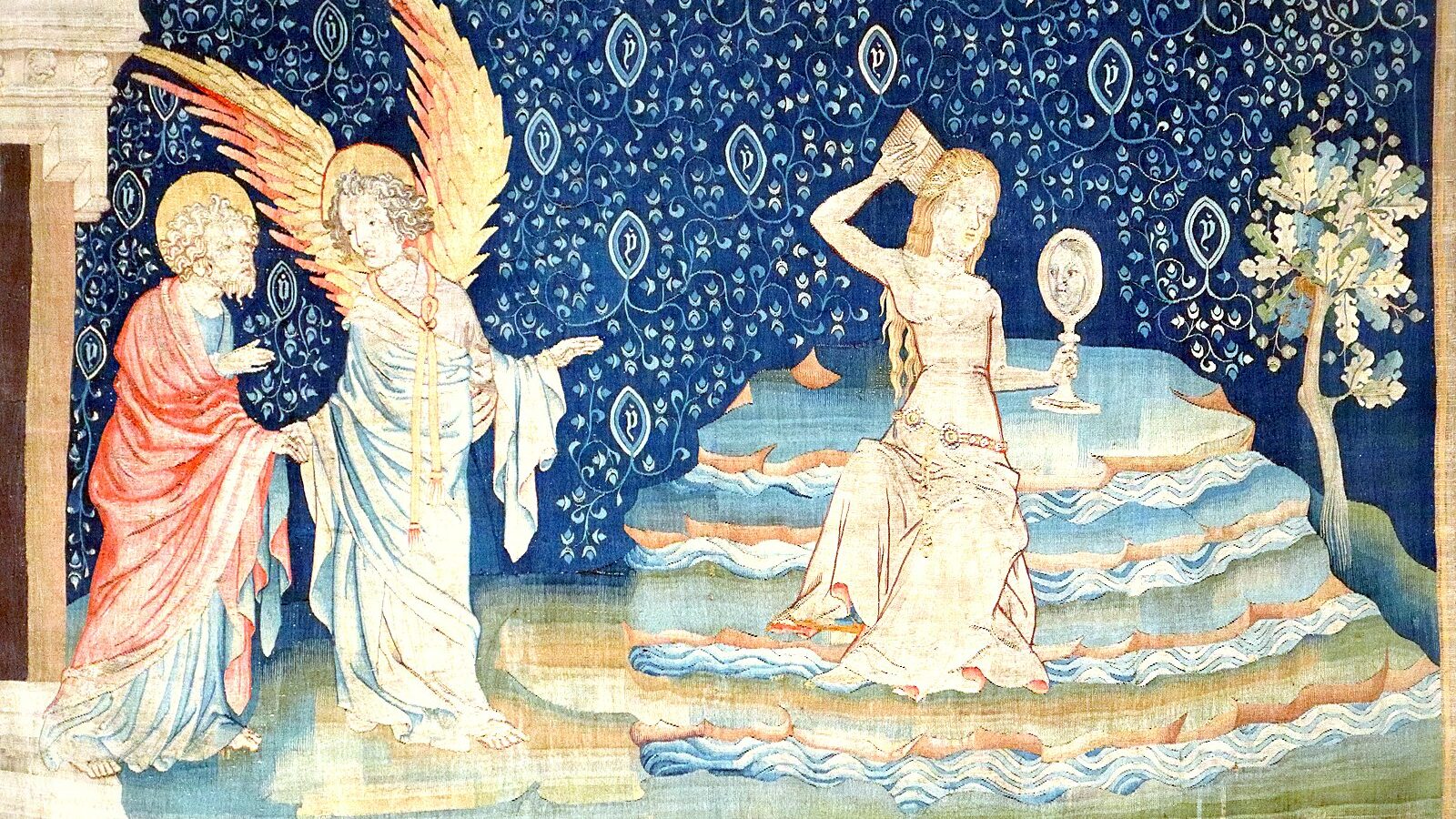 Un panneau de la tenture de l'Apocalypse d'Angers, un ange et une femme sur fond bleu étoilé
